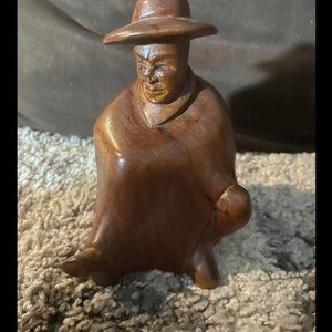 Hand carved wooden man figurine